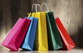 Composition with colorful paper shopping bags