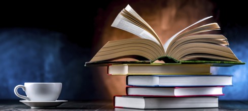 A composition with books and a cup of coffee