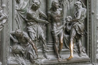 MILAN, ITALY/EUROPE - FEBRUARY 23 : Detail of the main door at the Duomo Cathedral in Milan Italy