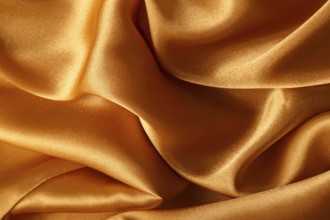 Texture of orange silk fabric, close up