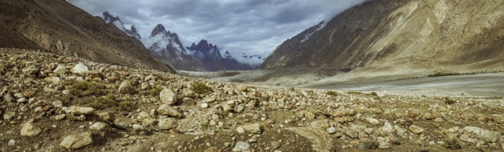Panorama of beautiful Karakoram Mountain Range with majestic peaks of Trango Towers above Baltoro