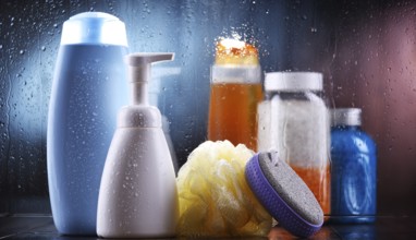 Different containers of body care products in the bathroom
