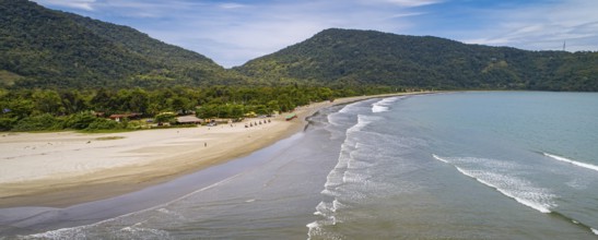 Aerial view along Green Coast shoreline with turquoise water, beach and green mountains, Brazil