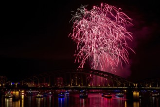 Fireworks in red lights, Cologne, Germany Cologne, Germany
