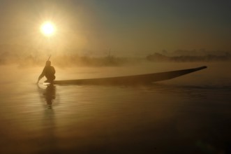Myanmar, Fisherman with boat at Inle Lake, Myanmar