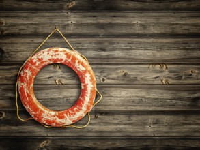 Lifebuoy at wooden background, copyspace for your text