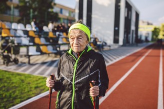 Active rest of the elderly theme. Sports and health in retirement. Caucasian very old woman with