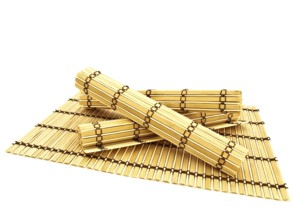 Photo Of Hand-Made Bamboo Mats Against The White Background