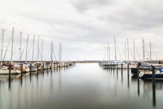 Sassnitz, Germany, August 1, 2019: Scenic long exposure view of sailing boats moored in the harbour