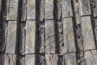 Detail of an old wooden gearwheel