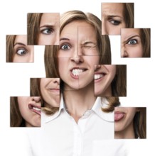 Collage of emotional woman face collected from different parts. Isolated on white