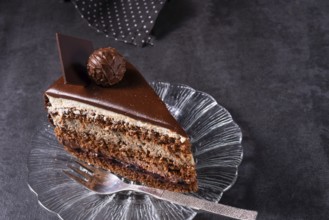 Chocolate cake Airy biscuits and a cream of cream and chocolate
