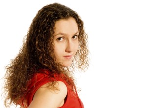 Portrait of a shy girl in red