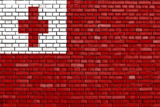 Flag of Tonga painted on brick wall