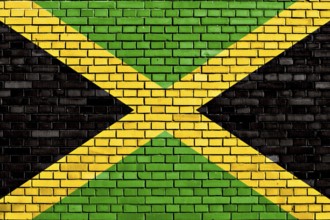 Flag of Jamaica painted on brick wall