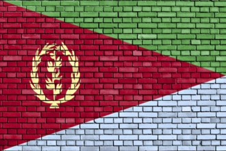 Flag of Eritrea painted on brick wall