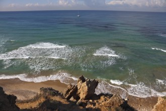 Warm winter in Israel. Coast of Mediterranean sea in serene silent midday