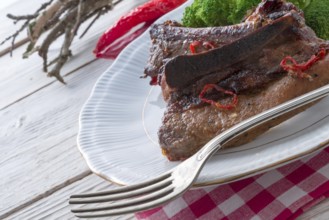 Grilled ones rib with broccoli