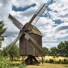 A view of a beautiful windmill in Germany in a natural setting and an eye catcher for tourists