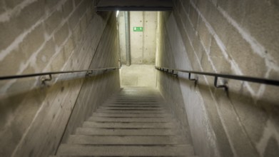 An image of stairs down to the basement