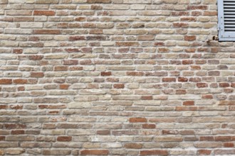 An image of a typical red brick wall background texture
