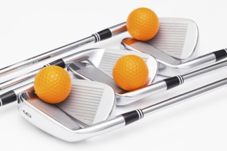 Titanium golf clubs on the white background