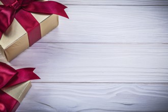 Box-containers with presents on wooden board copy space holidays concept