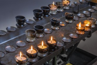 Sacrificial lights in the Catholic parish church of St Blasius in Dietmannsried, Allgäu, Bavaria,