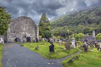 Cemetery with gravestones in Glendalough, Ireland
