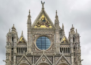 Main facade of Siena Cathedral (Duomo di Siena) is a medieval church in Siena, Italy. The cathedral