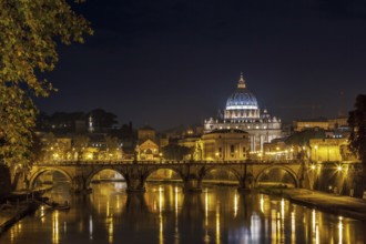 View of Ponte Vittorio Emanuele II and St. Peter's Basilica in evening, Rome