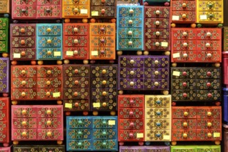 Small, colourful wooden crates at a market in Krakow, Poland