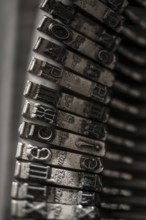 Metal letters on typewriter. Close up macro