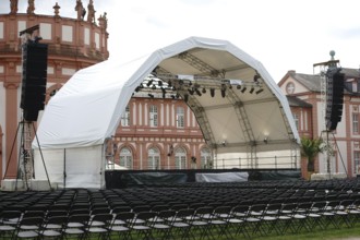 Wiesbaden, Germany - July 14, 2016: A concert stage set up with rows of seats for a classical