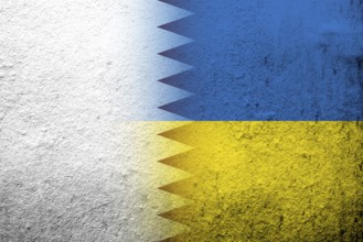 The State of Qatar National flag with National flag of Ukraine. Grunge background