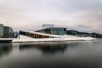 Oslo, Norway, August 10, 2019: Exterior view of Opera house in Oslo. Long exposure at dusk. New