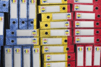 Romania Flag Colors Folder Stack, Bureaucracy and Government Administration Concep