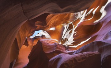 Shone orange and violet colors a canyon of Antelope in the USA in a bright sunny day