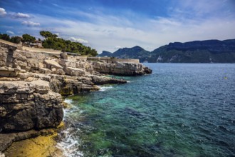 Abrupt stony coast and turquoise sea surface. Famous National Park Calanques on the Mediterranean