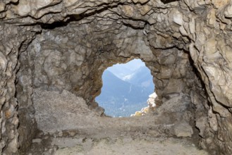View out of a loophole of the Mount Lagazuoi tunnels, built during the First World War, the