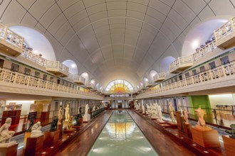 ROUBAIX, FRANCE, JUNE 14, 2024 : interiors Art Deco decors and sculptures of the olympic swimming