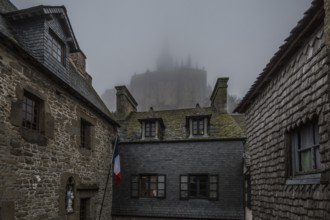 Mont-Saint-Michel, monastery hill, houses at the lower end of the Grande Rue above the abbey in the