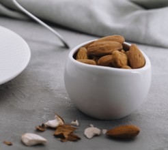 food still-life, Close up almonds on stone table