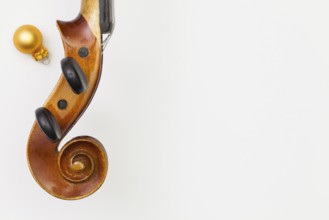 Top view close up shot of old violin and Christmas decoration. Flat Lay Image
