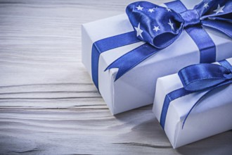 Gift boxes on wooden board vertical image celebrations concept