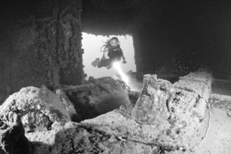 Diver finds teapot in the wreck of the HIJMS Nagato, Marshall Islands, Bikini Atoll, Micronesia,