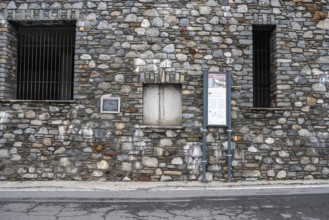 MUSSO, ITALY, OCTOBER 05, 2023, Information boards at the street in Musso, where dictator Mussolini