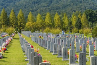Daejeon, South Korea, September 29, 2019: Family gathered at grave of loved one to pay respect at