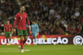 Football match, captain Cristiano RONALDO CR7 Portugal left, walking with view to the coaches bench