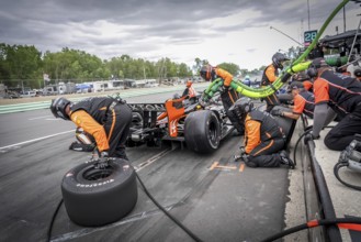 SANTINO FERRUCCI (14) of Woodbury, Connecticut comes down pit road for service during the XPEL